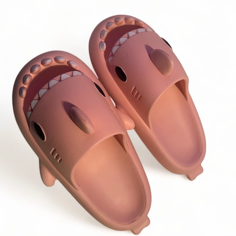 pink woman’s shark slides